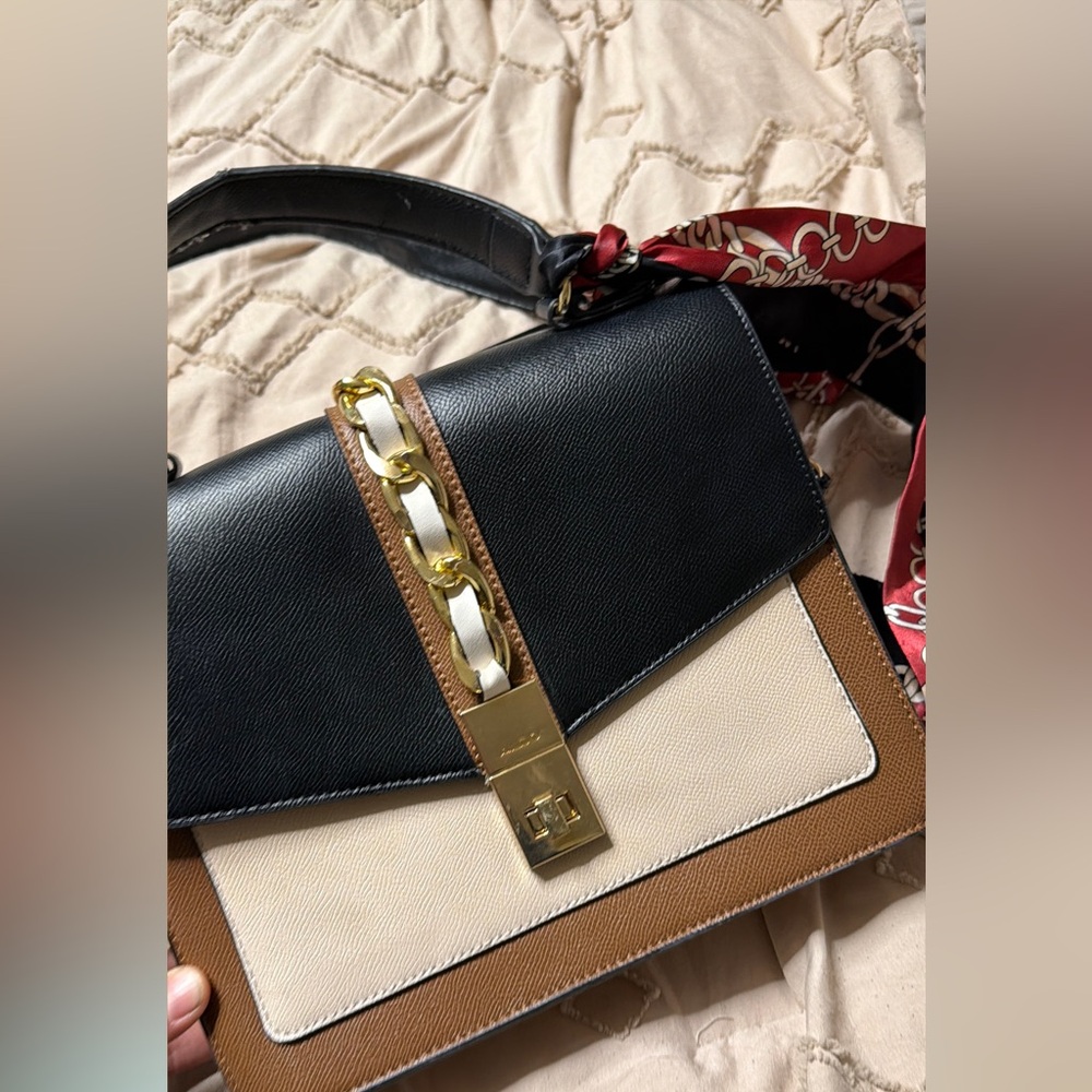 Aldo Elegant Black and Brown Women's Bag with red scarf